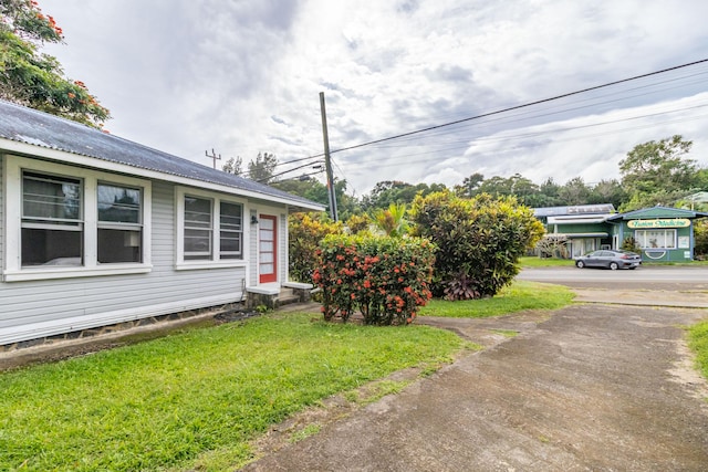 exterior space with a lawn