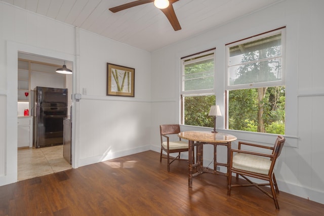 sitting room with ceiling fan and light hardwood / wood-style floors