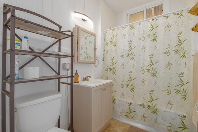 full bathroom with tile patterned floors, vanity, toilet, and shower / bathtub combination with curtain