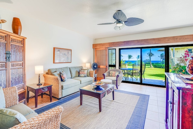 living room with ceiling fan and light tile patterned floors