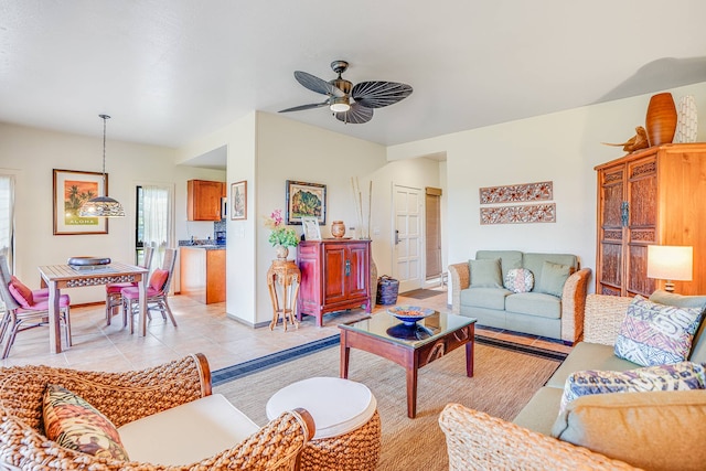 tiled living room with ceiling fan