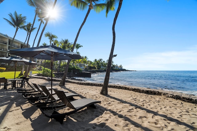 property view of water featuring a beach view