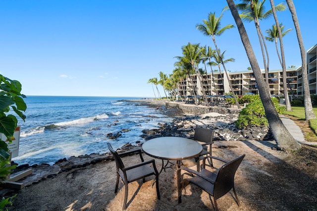 view of patio featuring a water view