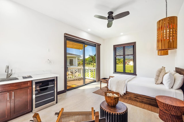 bedroom featuring wet bar, wine cooler, and access to outside