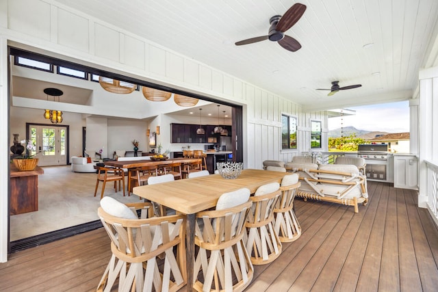 dining space with wooden ceiling, hardwood / wood-style flooring, and ceiling fan