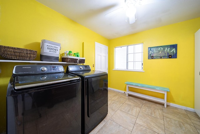 clothes washing area featuring ceiling fan, light tile patterned floors, and washer and clothes dryer