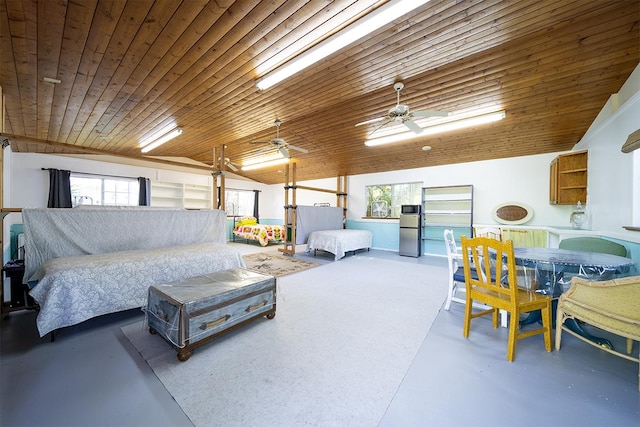 living room with wood ceiling, vaulted ceiling, and concrete floors