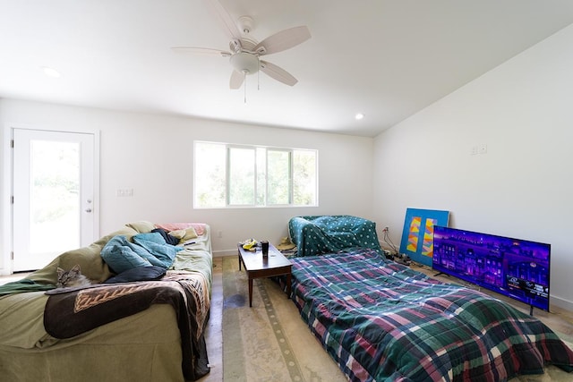 bedroom featuring ceiling fan and access to outside