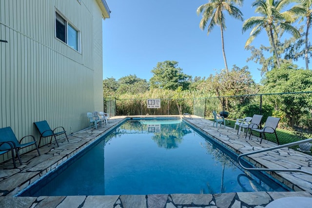 view of pool featuring a patio