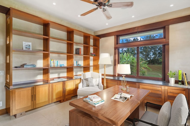 office area with ceiling fan