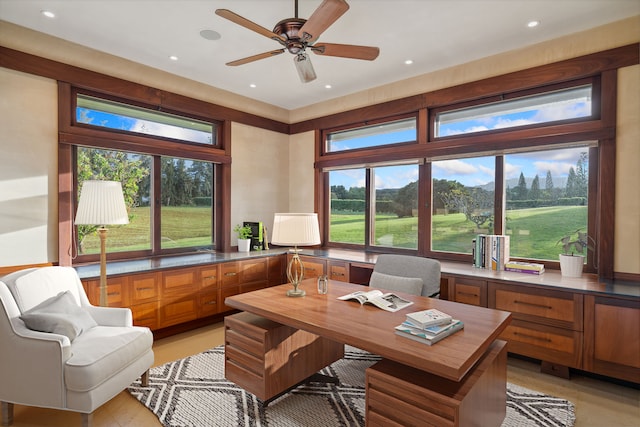 office area featuring ceiling fan and plenty of natural light