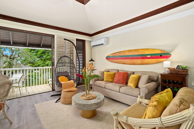 living room with hardwood / wood-style flooring, ornamental molding, and a wall mounted AC