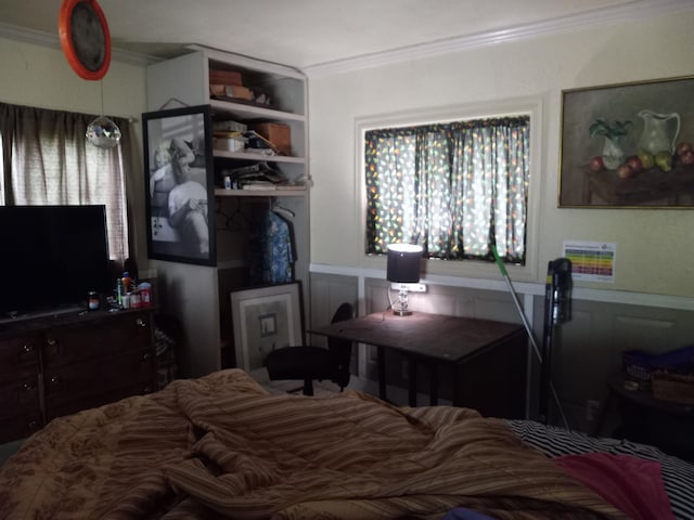 bedroom featuring crown molding