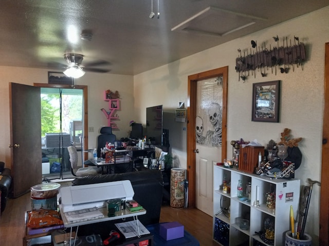 home office with ceiling fan and hardwood / wood-style floors