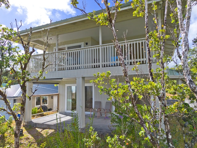 rear view of house featuring a patio area