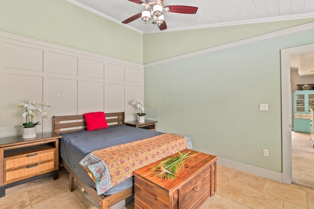 bedroom with crown molding, ceiling fan, lofted ceiling, and light tile patterned flooring