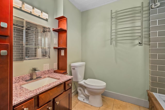 bathroom with tile patterned floors, radiator, vanity, and toilet