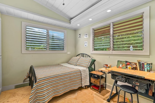 tiled bedroom featuring lofted ceiling