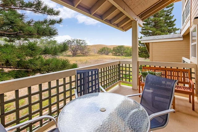 wooden balcony with a wooden deck