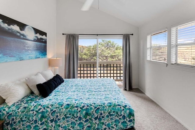 bedroom with access to exterior, carpet floors, and vaulted ceiling