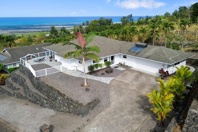 drone / aerial view with a water view