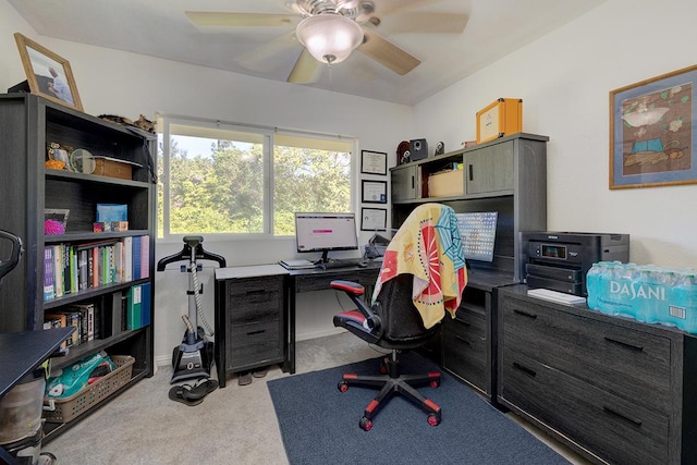 carpeted office with ceiling fan