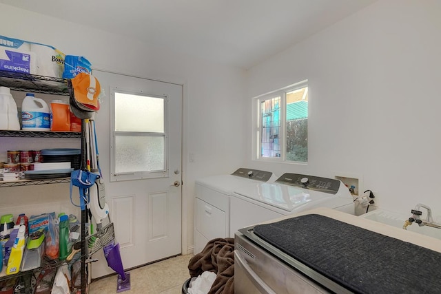 laundry room featuring washing machine and dryer