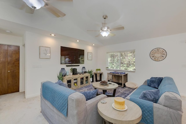 living room with light colored carpet and lofted ceiling