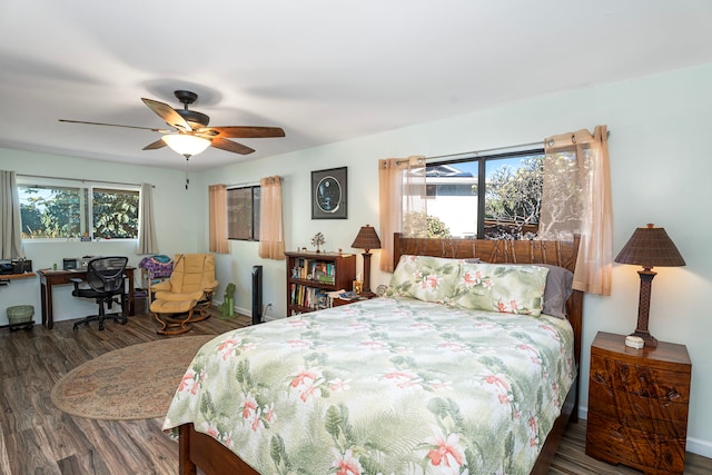 bedroom featuring dark hardwood / wood-style floors and ceiling fan