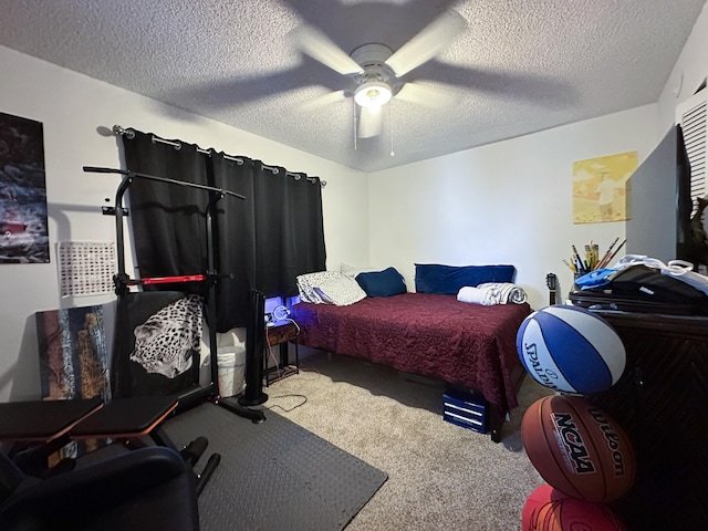 bedroom with carpet, a textured ceiling, and ceiling fan