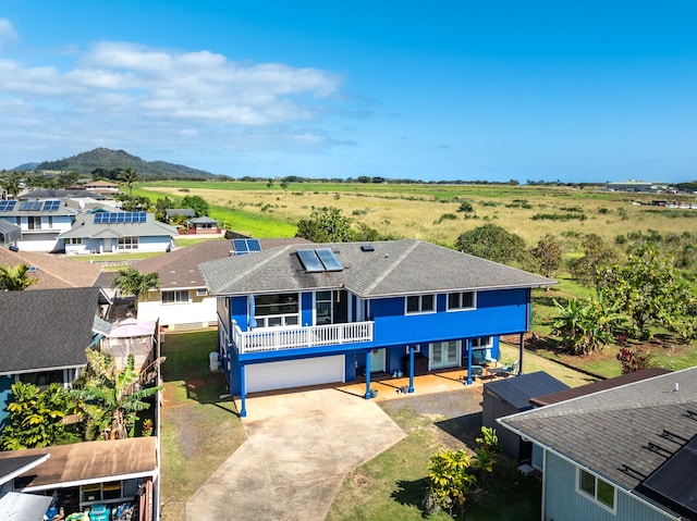 drone / aerial view featuring a mountain view