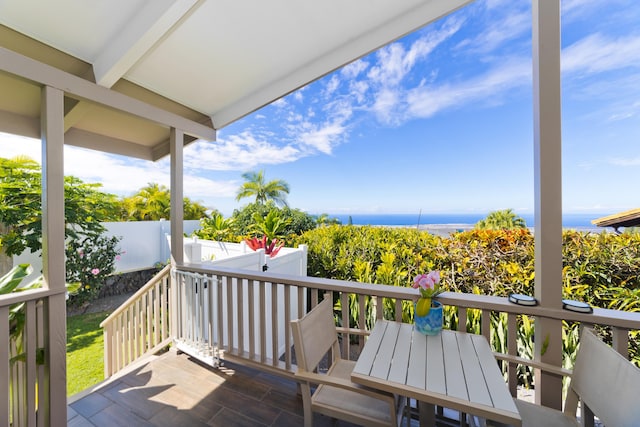 wooden terrace with a water view