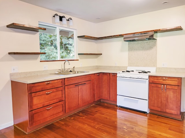 kitchen with sink, exhaust hood, white stove, and light hardwood / wood-style floors