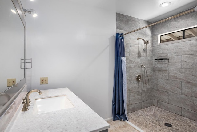 bathroom with vanity and walk in shower