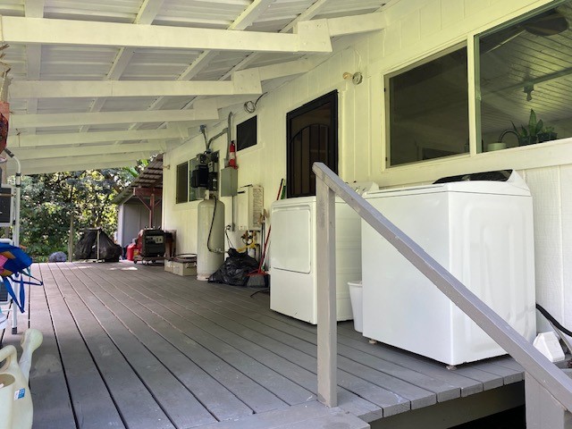 wooden terrace with washer / clothes dryer