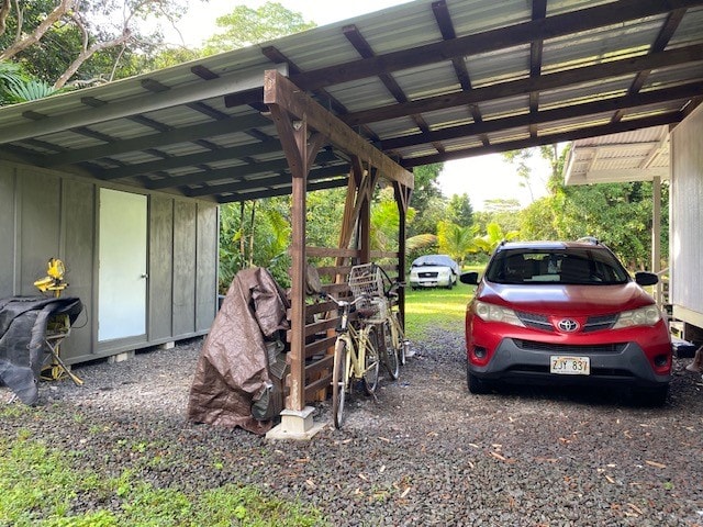 view of car parking featuring a carport