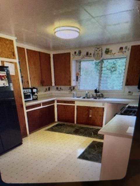 kitchen featuring sink and gas stovetop