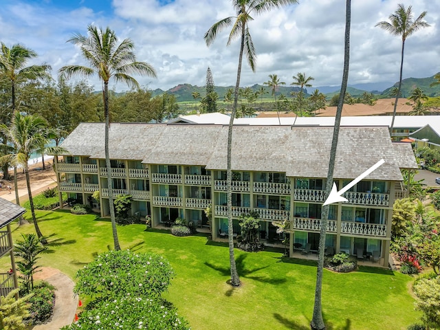 view of building exterior with a mountain view