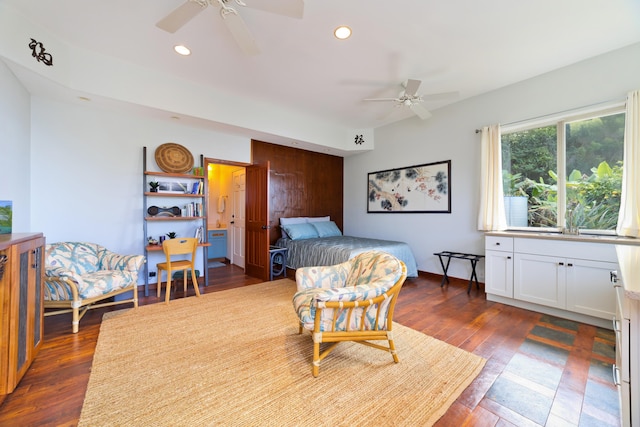 bedroom featuring ceiling fan and dark wood-type flooring