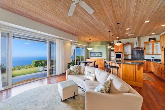 living room featuring wooden ceiling, hardwood / wood-style floors, and ceiling fan