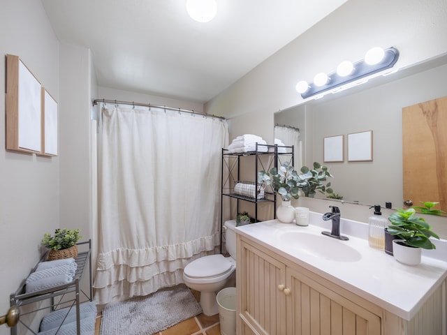 bathroom with walk in shower, tile patterned flooring, vanity, and toilet