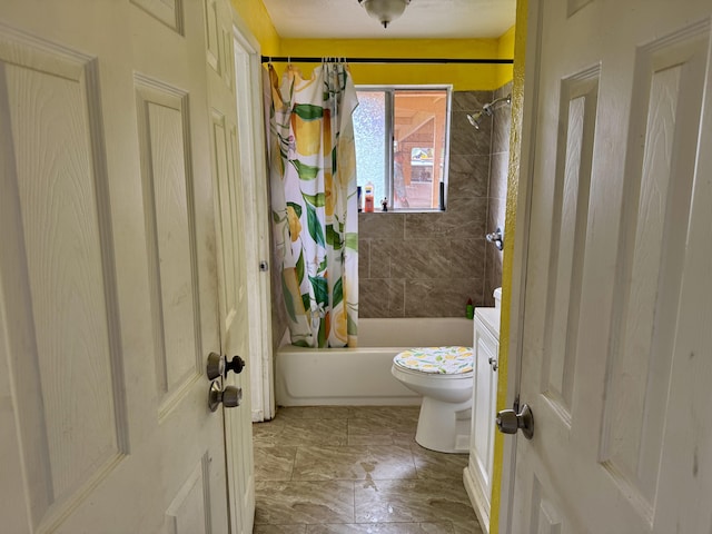 bathroom featuring toilet and shower / bath combo with shower curtain