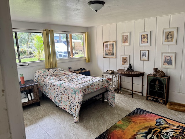 bedroom featuring a textured ceiling