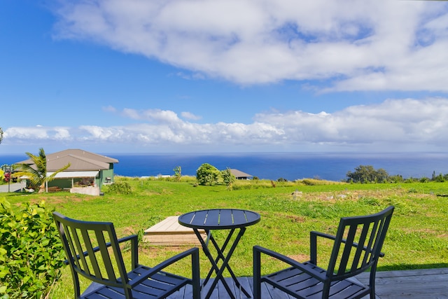 view of patio featuring a deck with water view