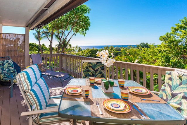 wooden terrace with a water view