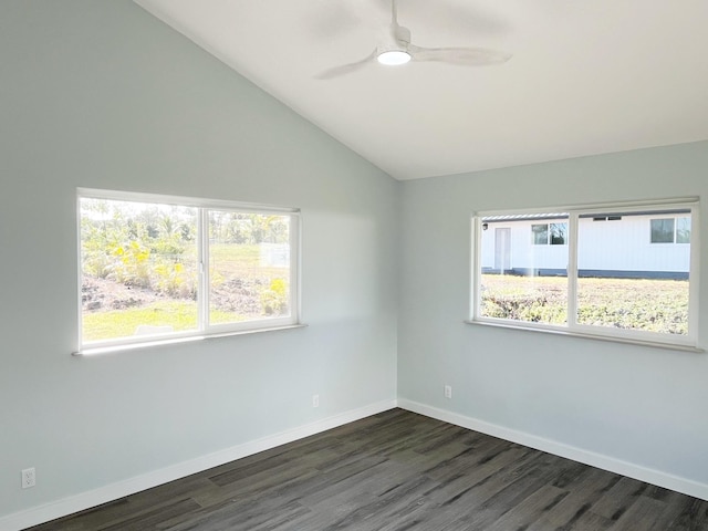 unfurnished room featuring ceiling fan, vaulted ceiling, and dark hardwood / wood-style flooring