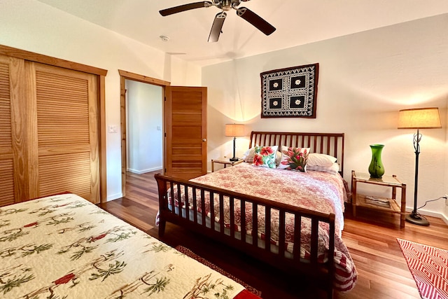 bedroom featuring hardwood / wood-style flooring and ceiling fan