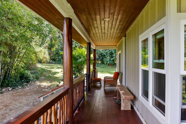 wooden deck featuring covered porch