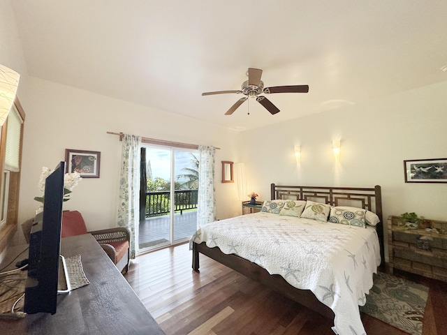 bedroom with dark hardwood / wood-style floors, ceiling fan, and access to outside