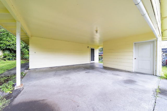 view of patio / terrace with a carport